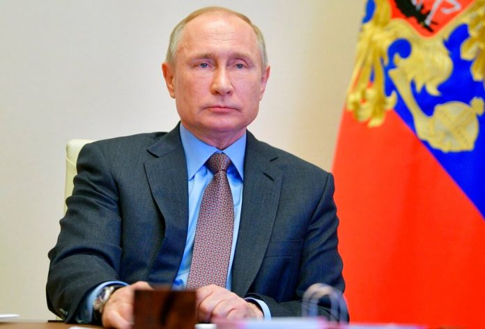 Putin signs law letting ex-presidents become senators for life