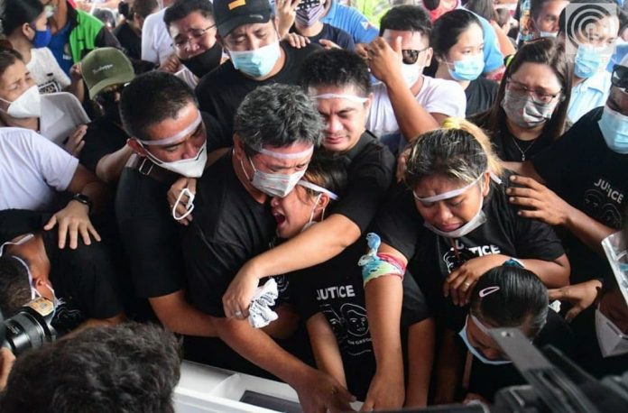 Filipino mum, son shot dead by off-duty policeman laid to rest