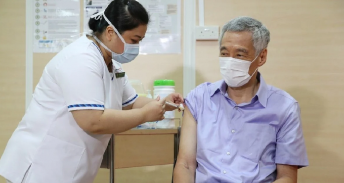 Singapore PM Lee completes full Covid-19 vaccination regimen