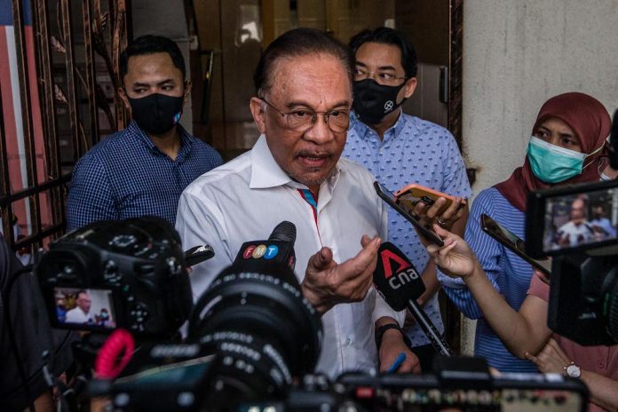 Stop intimidation and resolve matters democratically, Anwar tells Perikatan govt after police probe over calls to overturn Emergency