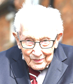 Britain’s ‘Captain Tom’ lockdown hero hospitalised with Covid-19