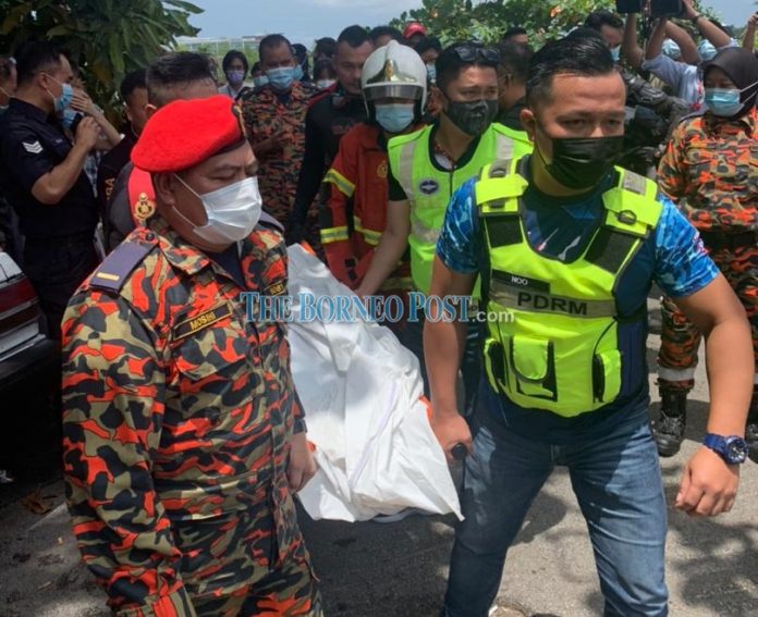 Woman’s body removed from car that plunged into Sungai Sarawak
