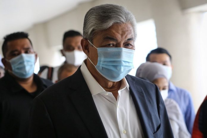 Ahmad Zahid’s corruption trial again postponed over Covid-19 close contact