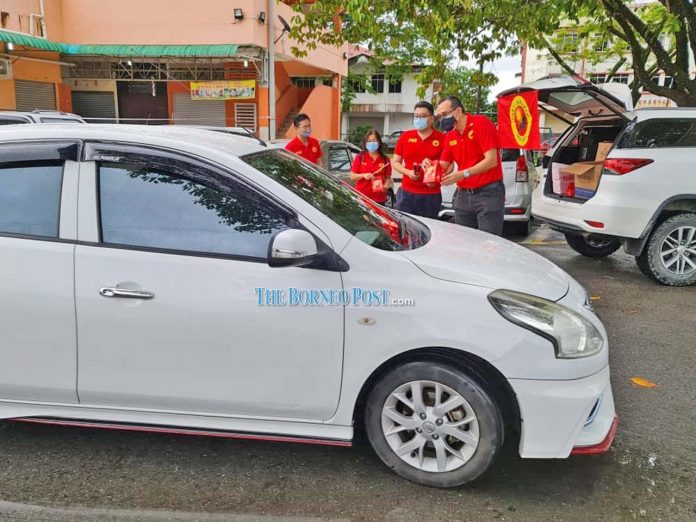 PSB branches distribute CNY gift packs at Krokop 10 Market