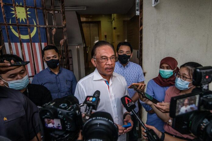 Anwar coy on GE15 collaboration with Umno, says parties still feeling each other out