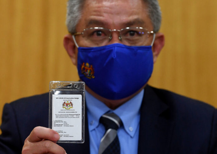 Dr Adham, Mohd Zuki receive second dose of Covid-19 vaccine