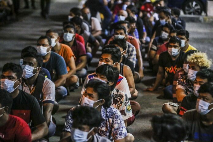 KL Immigration Dept detain 205 foreigners in Pudu apartment raid