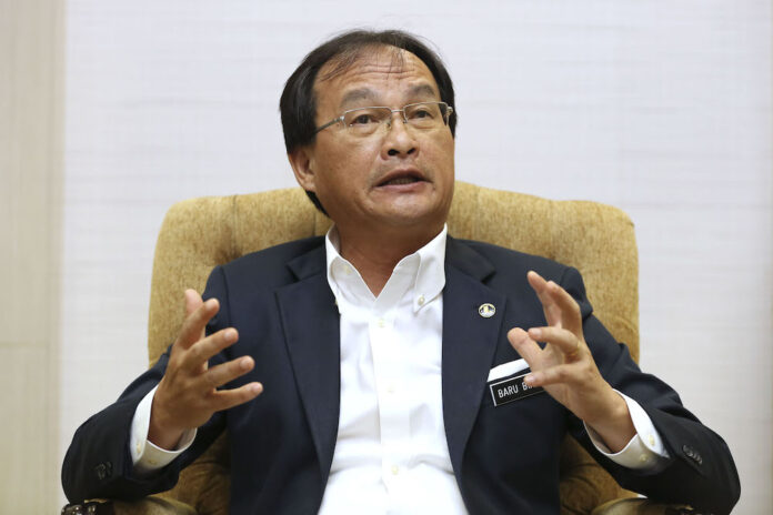 Make a stand to oppose any move by Umno to make Shariah law the supreme law, Sarawak and Sabah leaders told