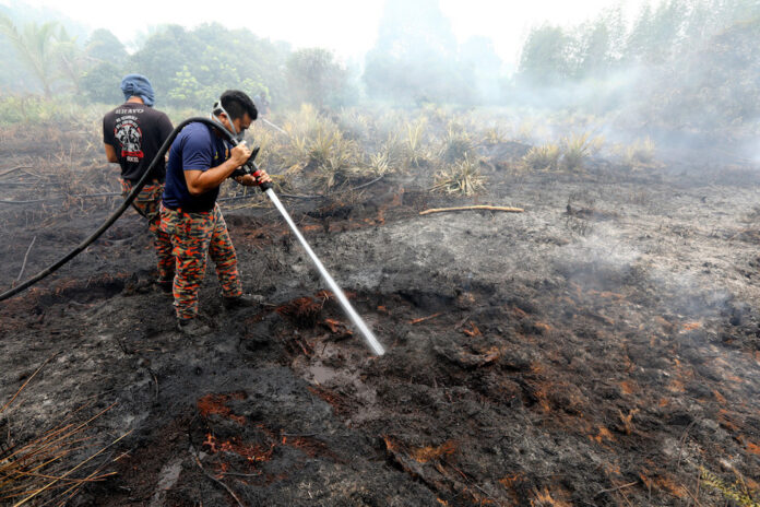 Melaka Fire and Rescue Dept monitors 12 bush hotspots for fire