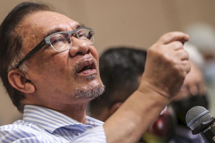 Anwar downplays cooperation snub at Umno assembly as rhetoric