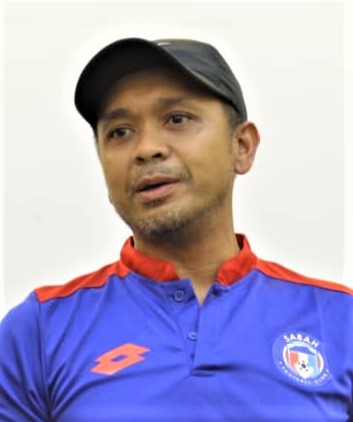 Kurniawan gets stern warning