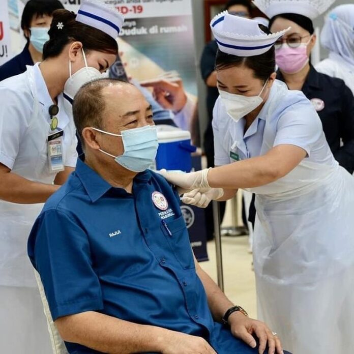 Sabah CM Hajiji receives Covid-19 jab, says ready to kick off statewide vaccination