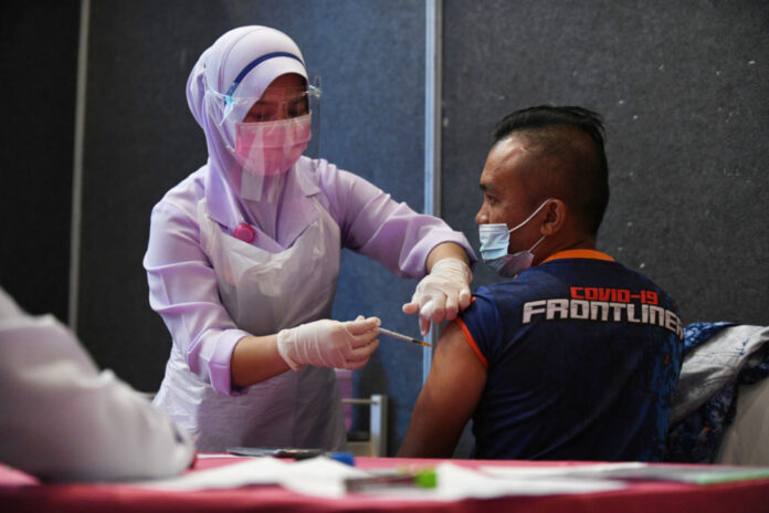 Health minister: Individuals who jump queue for vaccine jabs can be fined RM50,000, jailed six months