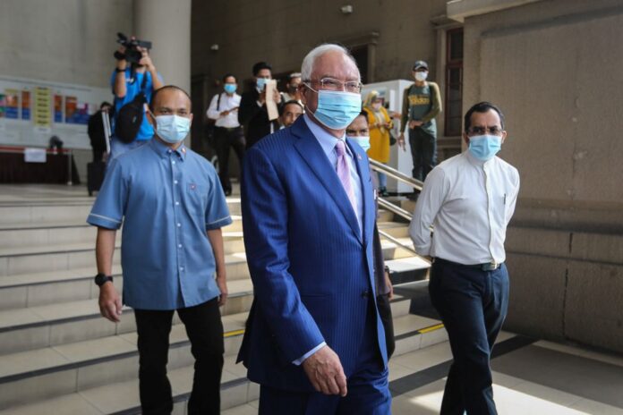 Najib admits didn’t check in with MySejahtera at restaurant, asks for authorities to take action