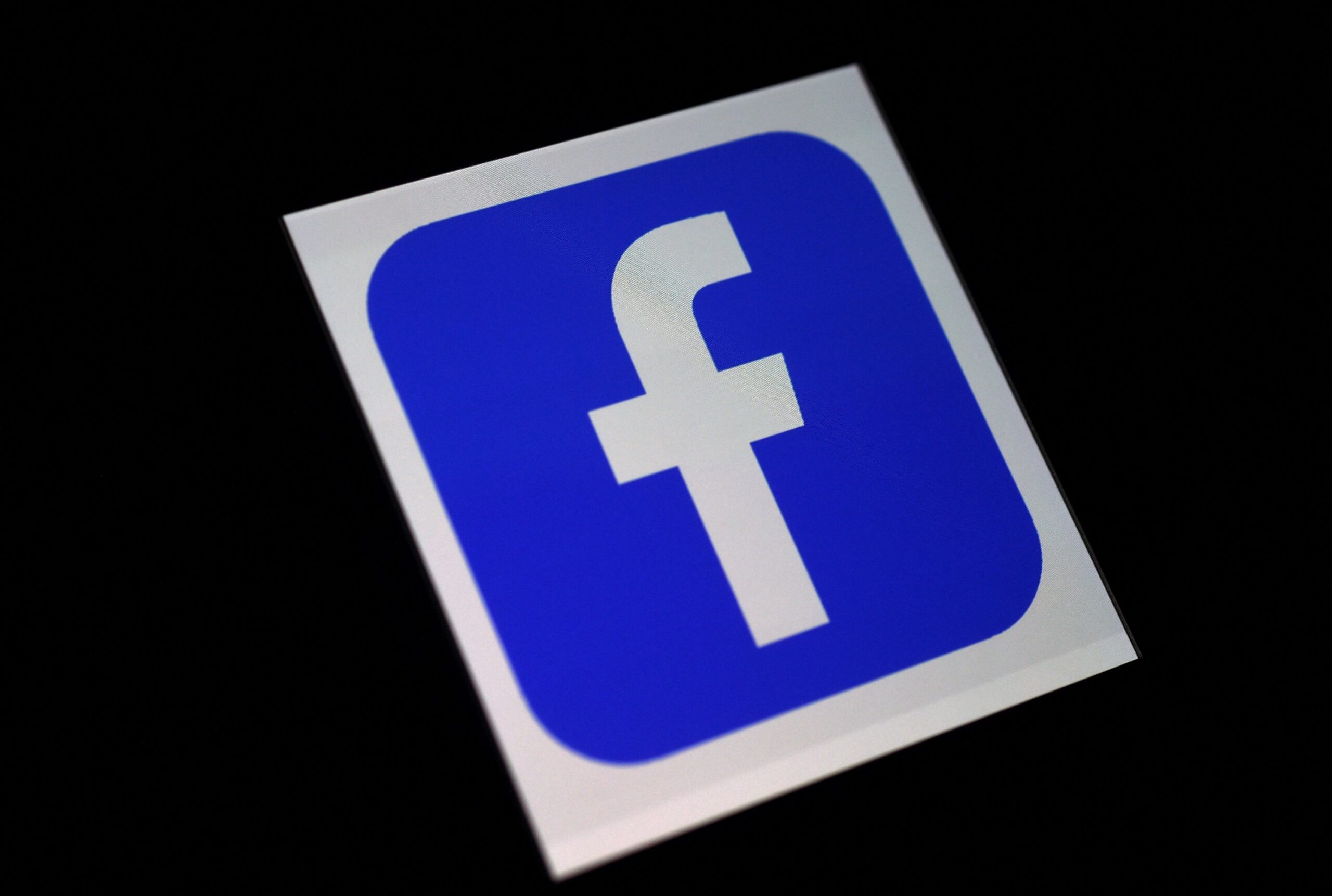 Facebook profit nearly doubles as user ranks grow