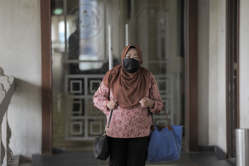Condominium CCTV recording played at ex-spy chief’s CBT trial
