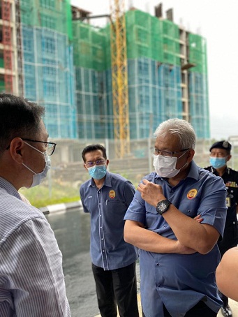 Minister not happy over delay of quarters project