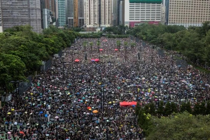 Veteran Hong Kong activists convicted over huge democracy rally