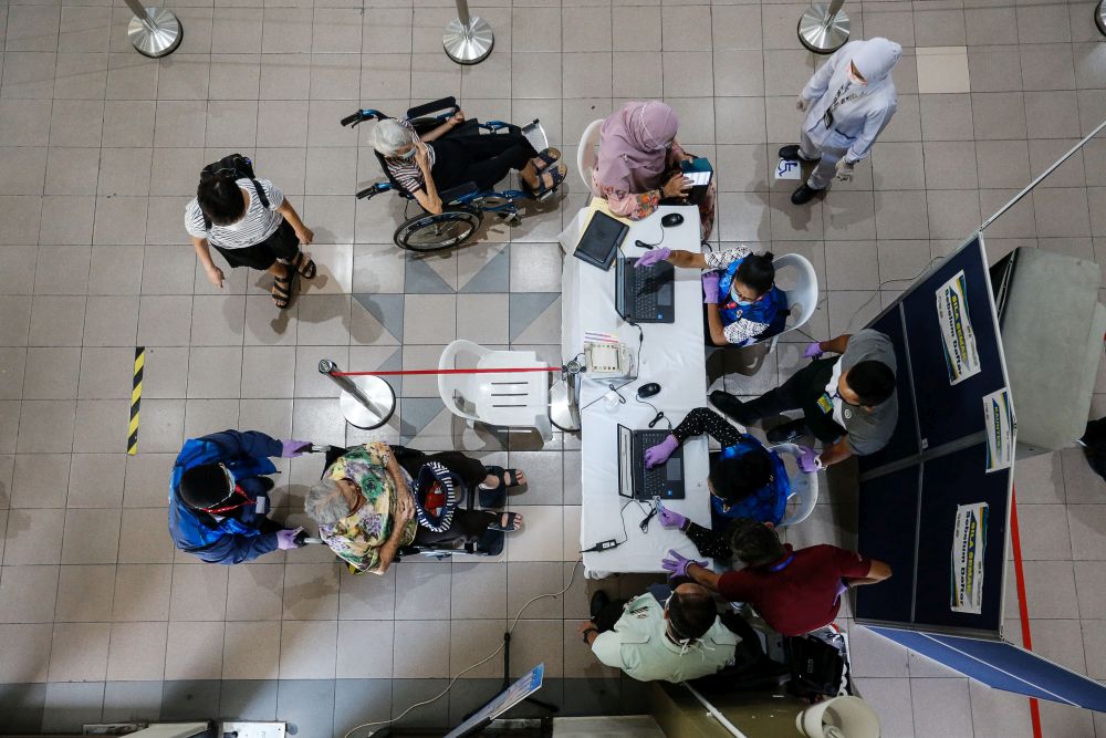Criticising low Covid-19 vaccination rate, Anwar tells Putrajaya to let state governments, firms assist rollout