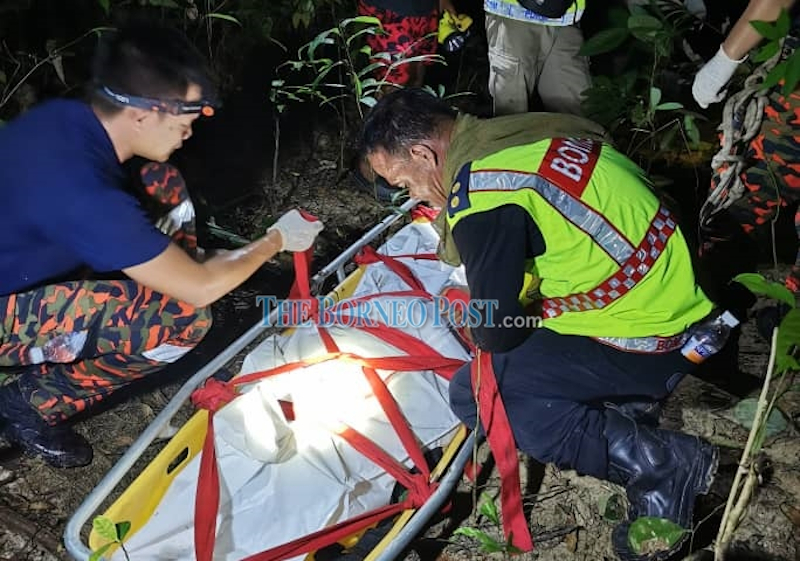 Rescuers retrieve body of man believed to be shot by brother during hunting trip gone wrong in Sarawak