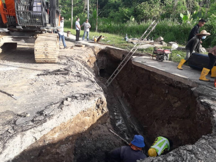 Sink hole caused by broken pipe under immediate repairs