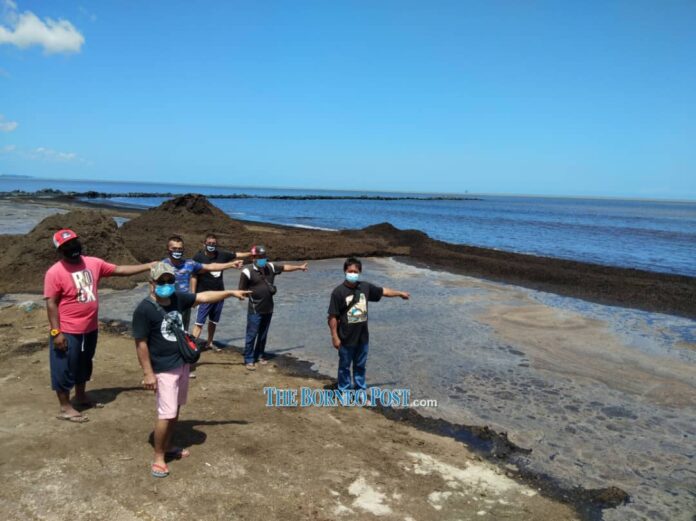 Uncleared wooden debris preventing Kg Batu Satu fishermen from going to sea