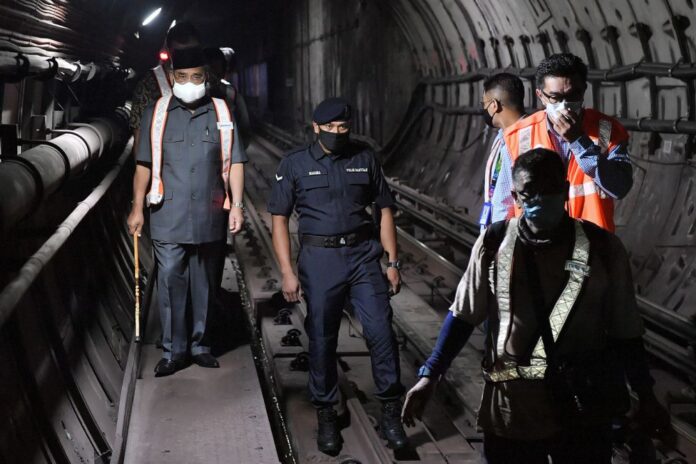 Tajuddin says did not wear face mask so press can hear him