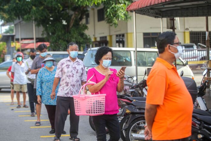 Malaysia’s Covid-19 infection curve starts to show sign of flattening