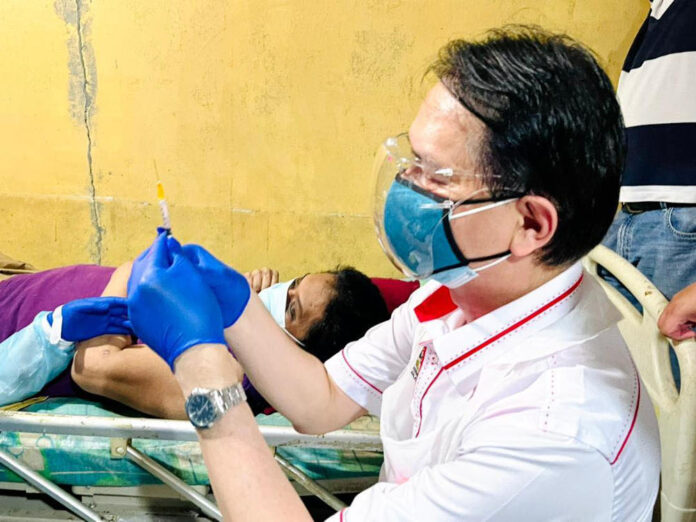 Dr Noor Hisham goes to the ground to administer Covid-19 vaccine