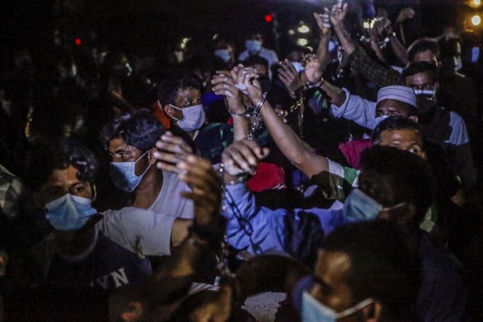 Malaysian medical group condemns govt raid, treatment of migrant workers in Cyberjaya in fight against Covid-19