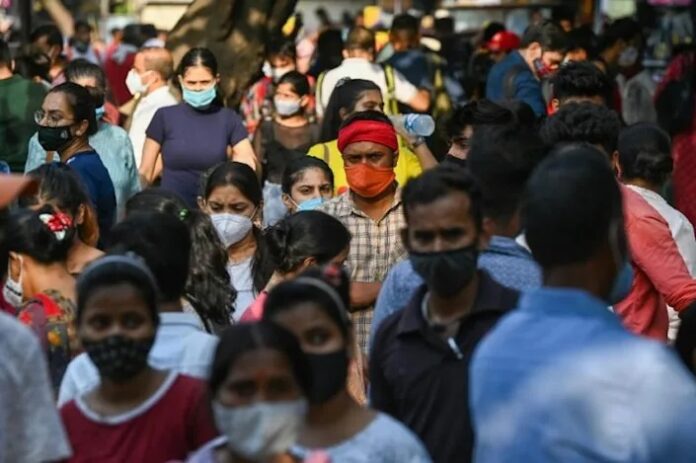 ‘Cooped up’ Indians throng malls and markets weeks after Covid surge