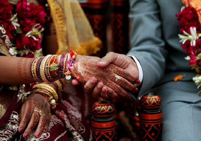 Bride in India dies of heart attack during wedding ritual, groom marries her younger sister