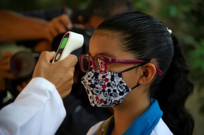 Excited but nervous, Mexican children return to classrooms
