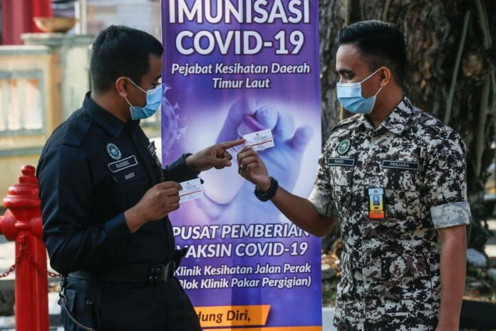 Deputy police chief: 80pc of KL contingent cops vaccinated against Covid-19