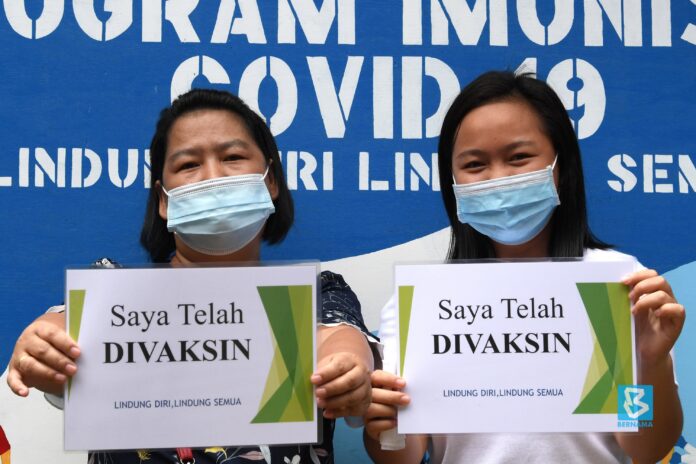 Vaccination team welcomed like superheroes in Kinabatangan interior area