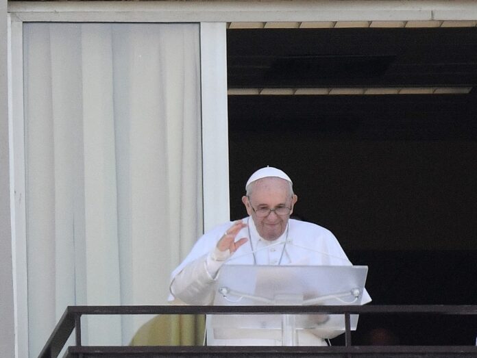 Pope greets faithful for prayer from Rome clinic balcony