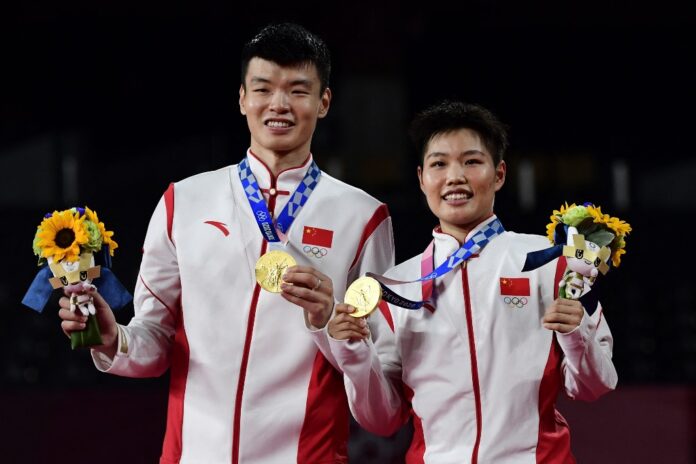 China’s Wang, Huang win badminton mixed doubles gold at Tokyo Olympics