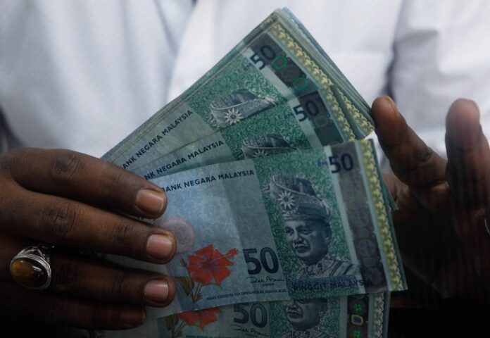 Putrajaya to revise fiscal deficit forecast after launching Pemulih package