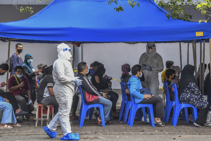 After record high yesterday, Malaysia reports 14,516 new Covid-19 cases