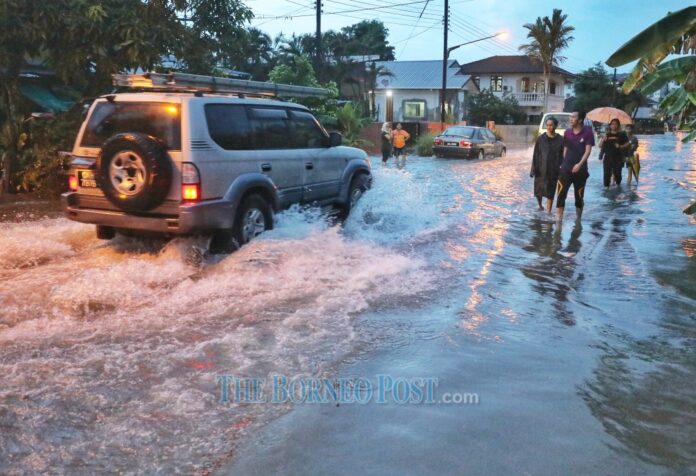 Heavy downpour causes flash floods in several locations in Kuching