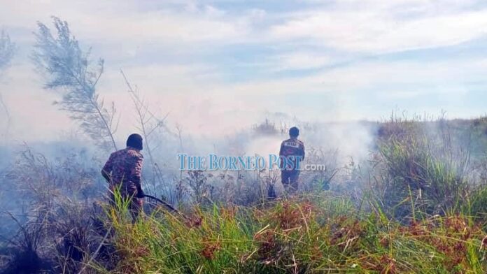Firemen deployed to put out bushfires at Jalan Pesisir Lutong, Tanjung Baram in Miri