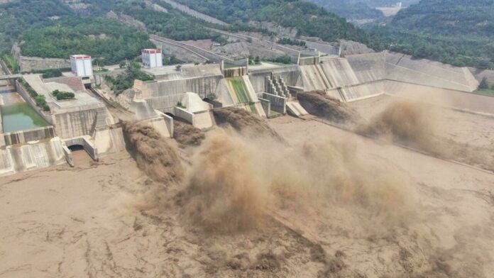 Chinese army warns dam battered by storms could collapse