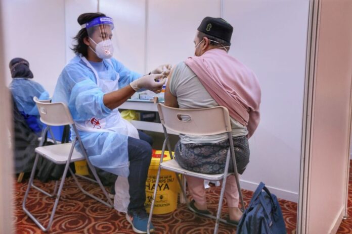 Malaysia’s daily Covid-19 vaccinations nears record with 446,052 shots administered; 21pc of adults fully protected