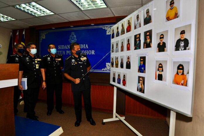 Johor cops arrest 26 people suspected of online prostitution