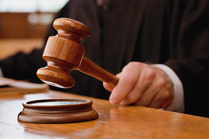Woman fined over FB posting on cop