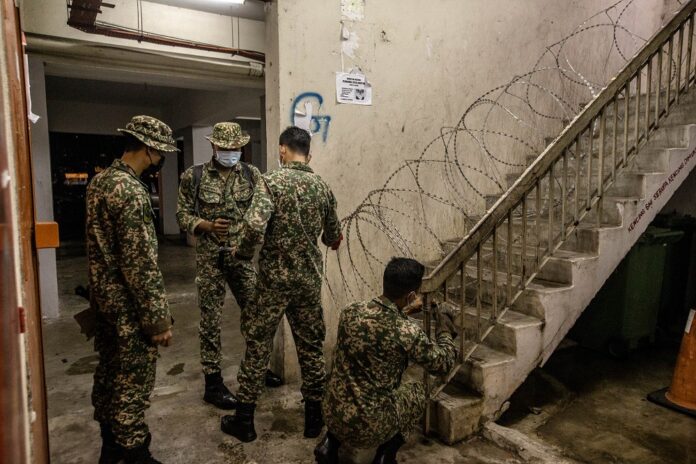 Bomba chief, FT minister say barbed wire blocking fire escape routes in EMCO areas must go