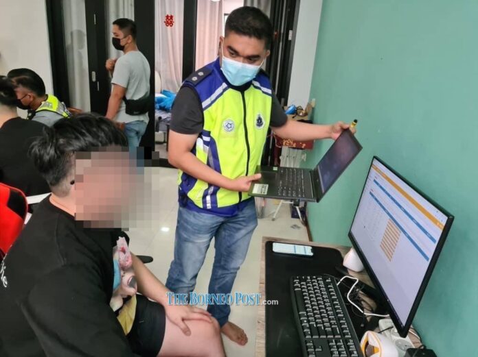 Cops raid Jalan Stutong house used as online gambling, Euro 2020 bookie centre