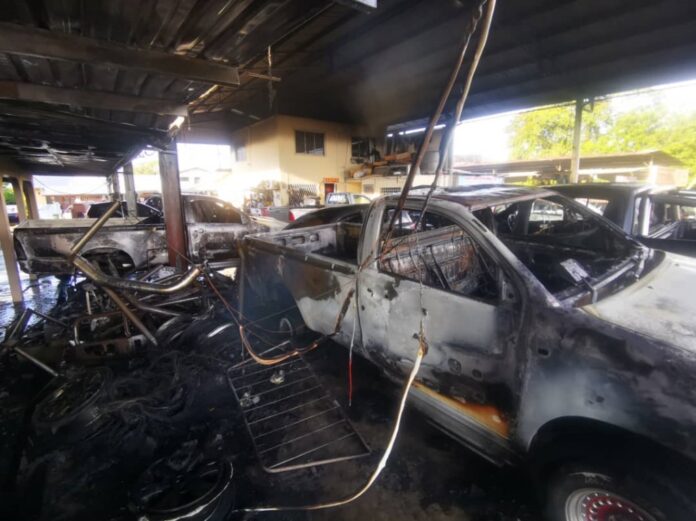 Five vehicles damaged in car workshop fire
