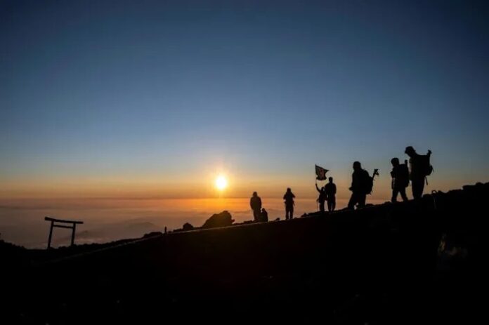 ‘Purified’: Japan’s hikers return to Mount Fuji