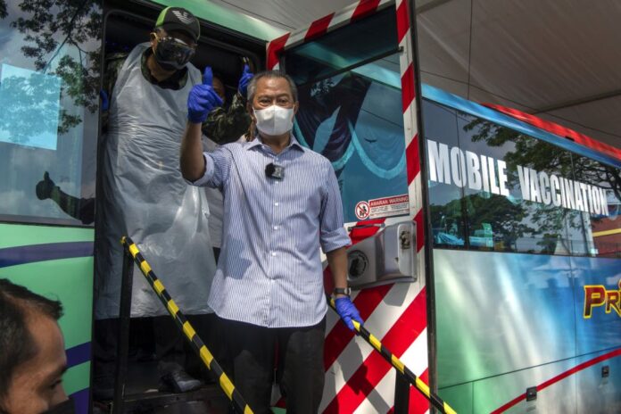 Muhyiddin says Malaysia inching closer to herd immunity as daily Covid shots surpass 420,000